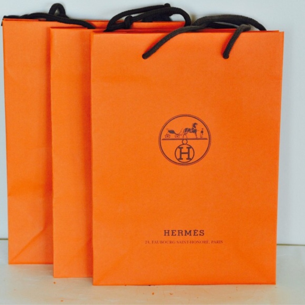 One 100% authentic Hermes orange tall paper shopping bag mint